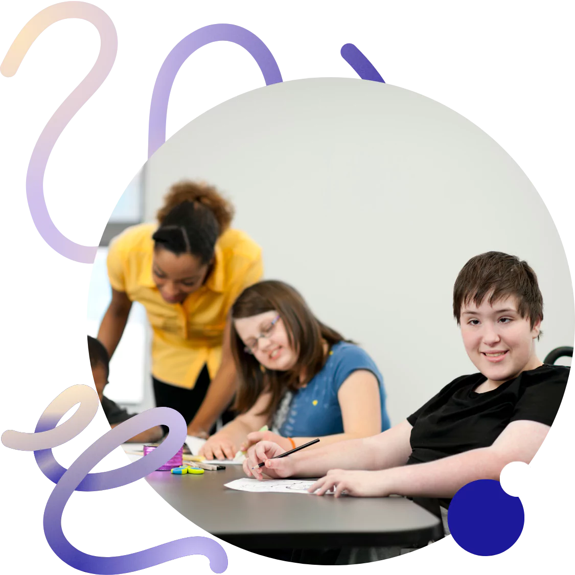 A disabled woman smiling at the camera with her classmates, and teachers together as they enjoy drawing.